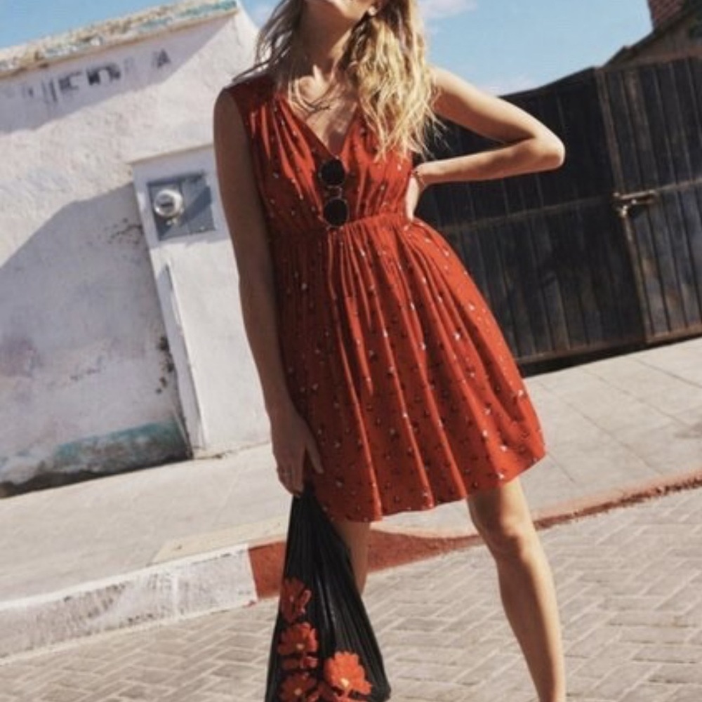 Madewell Magnolia Tie-Back Dress in red with a white and black floral pattern.